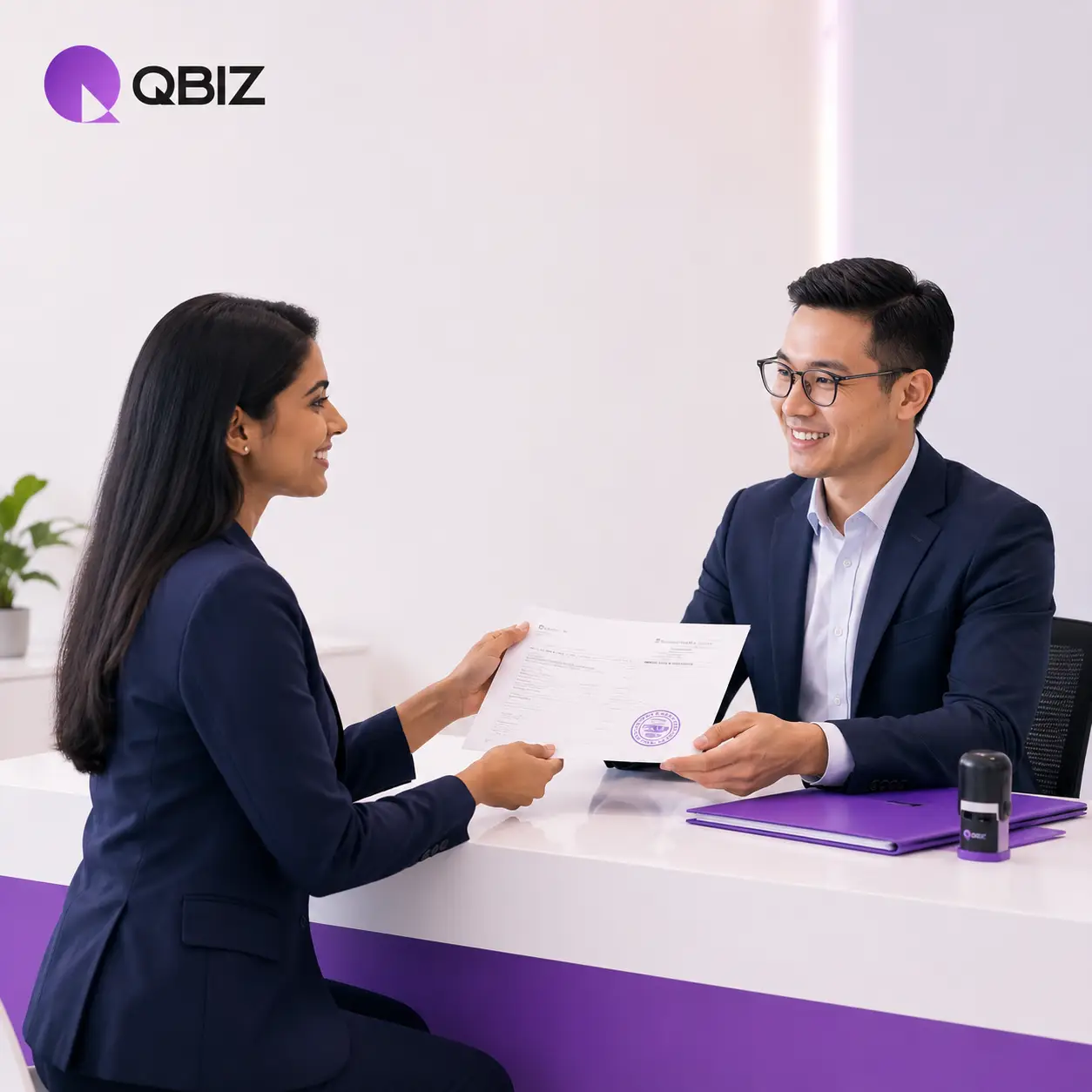 Professional business consultant handing attested certificate to client at Qbiz office